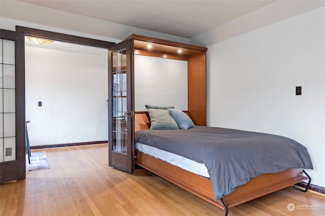 bedroom featuring light hardwood / wood-style floors