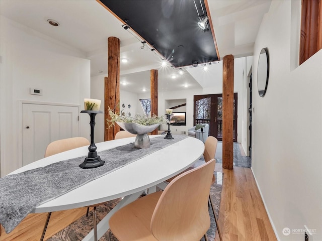 dining room with light hardwood / wood-style flooring