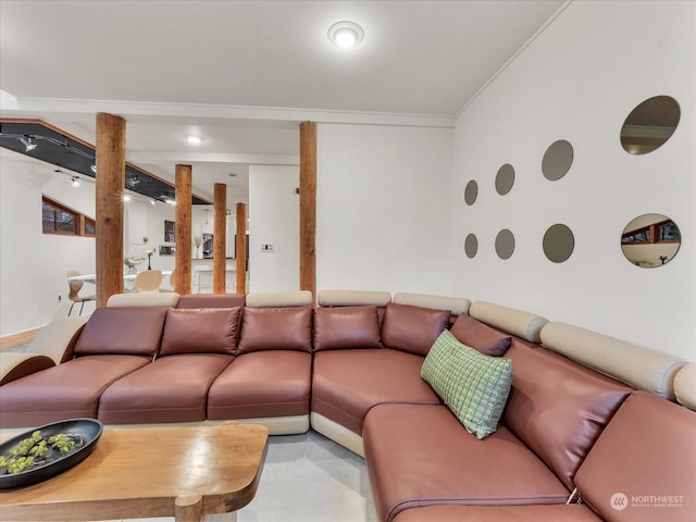 living room with ornamental molding