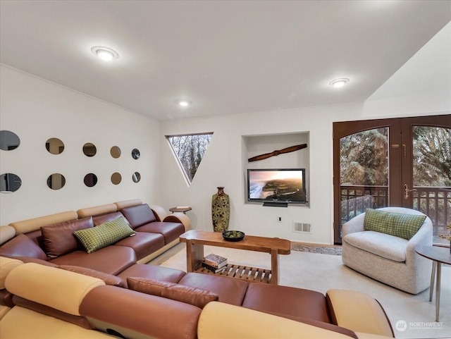 living room with light colored carpet