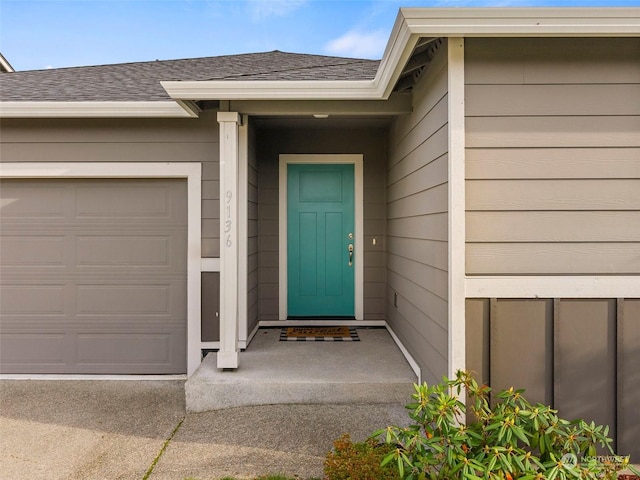 property entrance featuring a garage