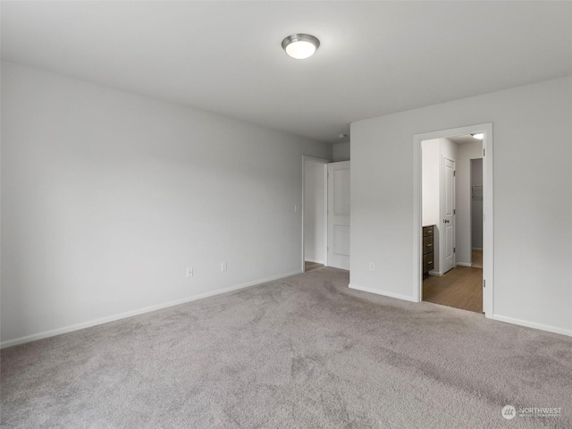 unfurnished bedroom with carpet flooring