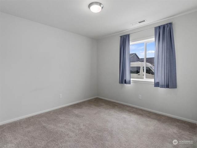 view of carpeted spare room