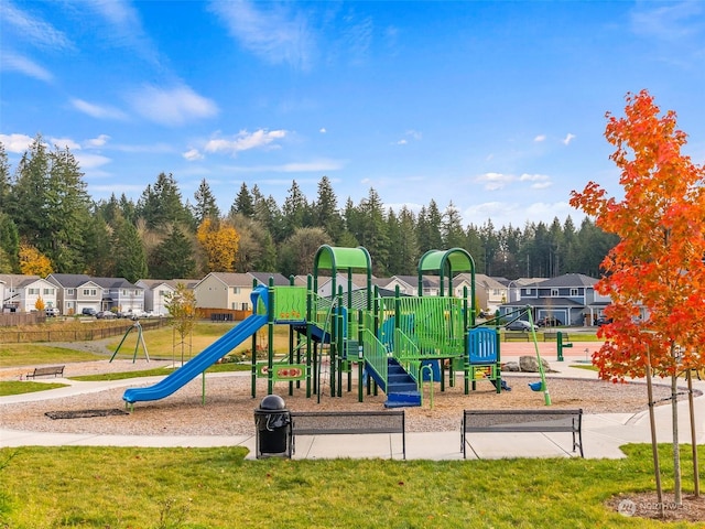 view of playground featuring a lawn