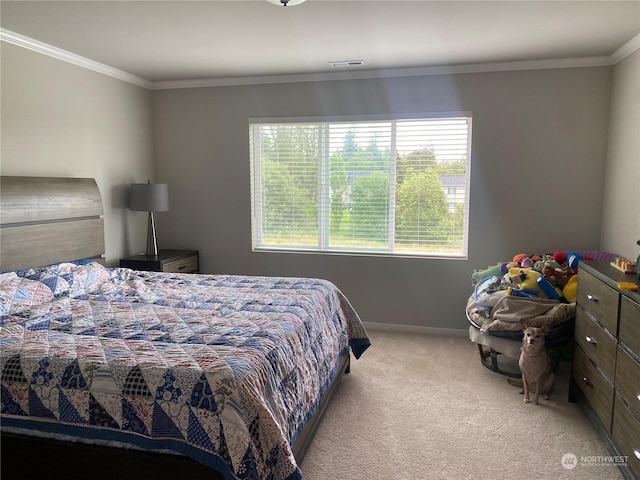 carpeted bedroom featuring crown molding