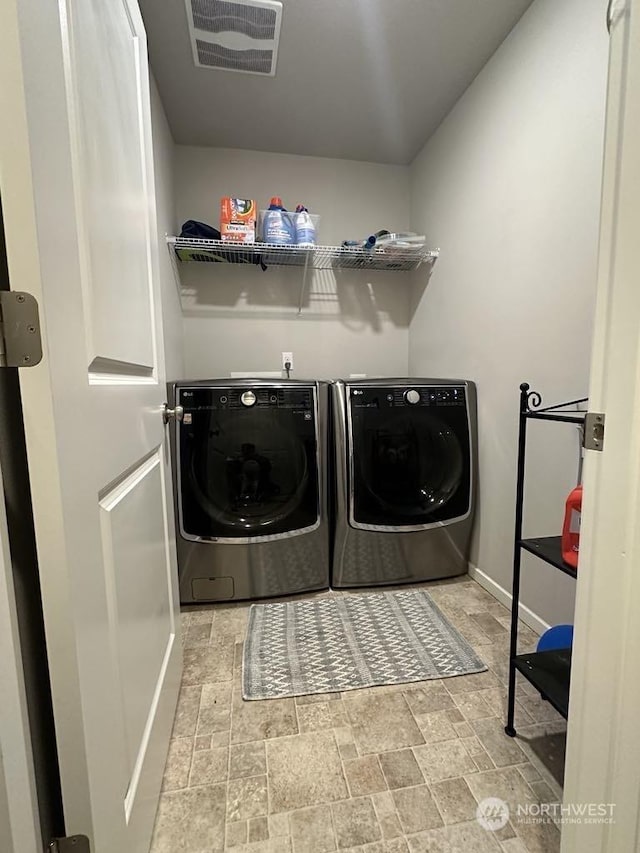 laundry area featuring washer and dryer