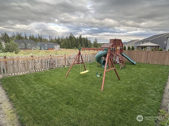 view of playground featuring a yard