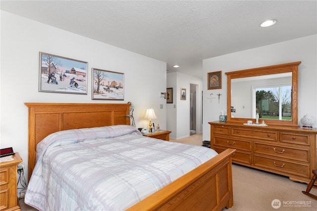 bedroom featuring recessed lighting and light carpet