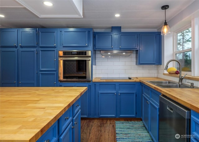 4495 Sequim Dungeness Way, Sequim, WA 98382 - kitchen featuring butcher block counters, stainless steel appliances, blue cabinets, tasteful backsplash, and hanging light fixtures