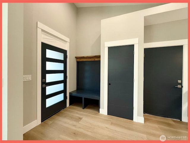 109 Sunrise Ave SE, Ocean Shores, WA 98569 - entrance foyer featuring wood finished floors and baseboards