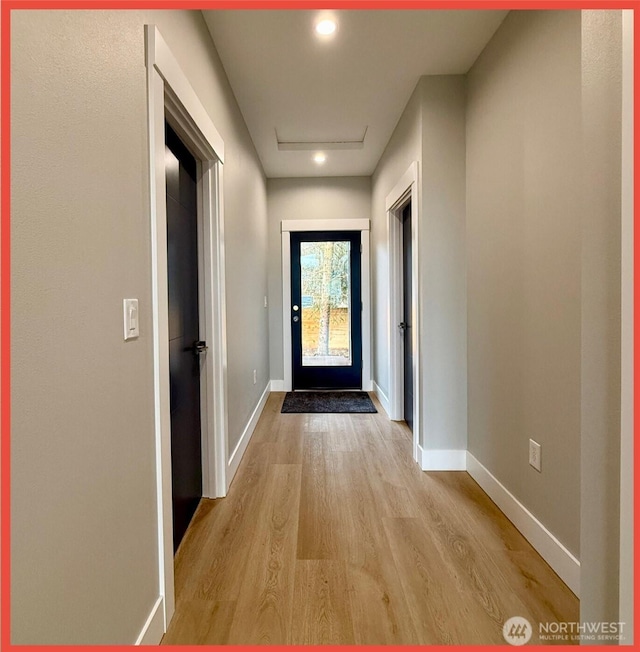 109 Sunrise Ave SE, Ocean Shores, WA 98569 - entryway featuring wood finished floors, baseboards, and recessed lighting