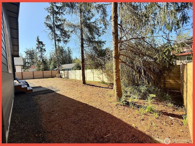 109 Sunrise Ave SE, Ocean Shores, WA 98569 - view of fenced backyard