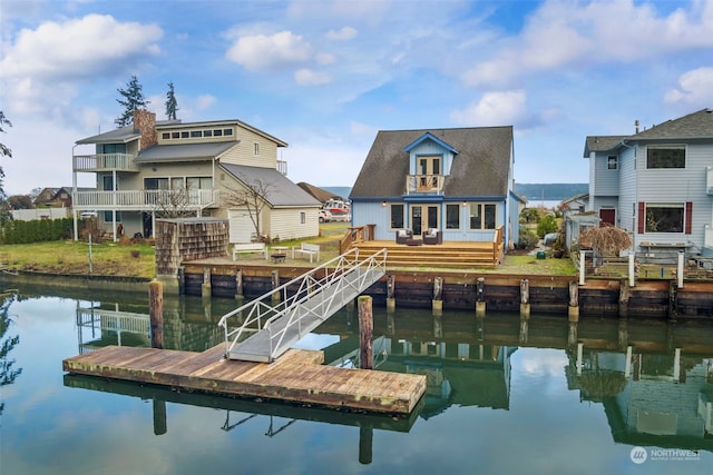 dock area with a deck with water view