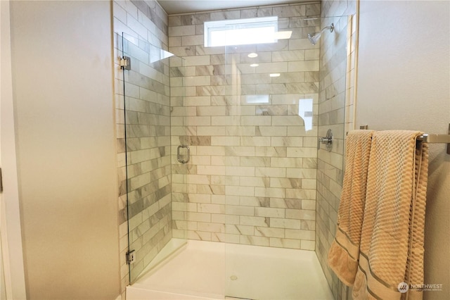 bathroom featuring an enclosed shower