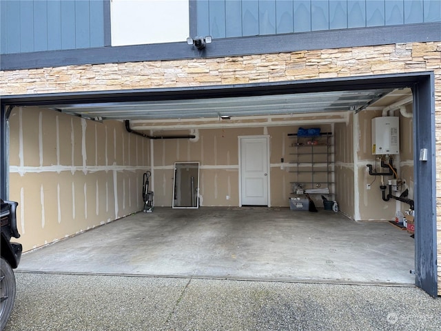 garage featuring water heater