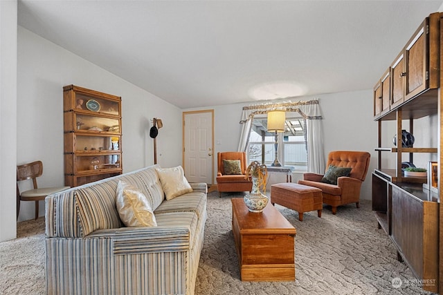 living room with light carpet and vaulted ceiling