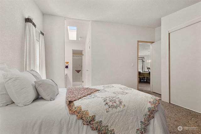 carpeted bedroom with a closet