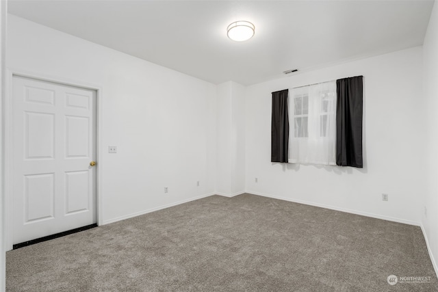 empty room with carpet floors