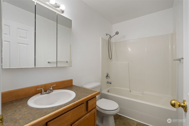 full bathroom with tile patterned flooring, vanity, shower / bathtub combination, and toilet