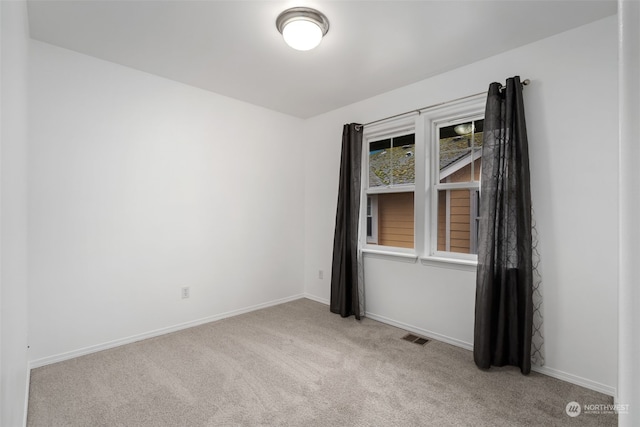 view of carpeted spare room