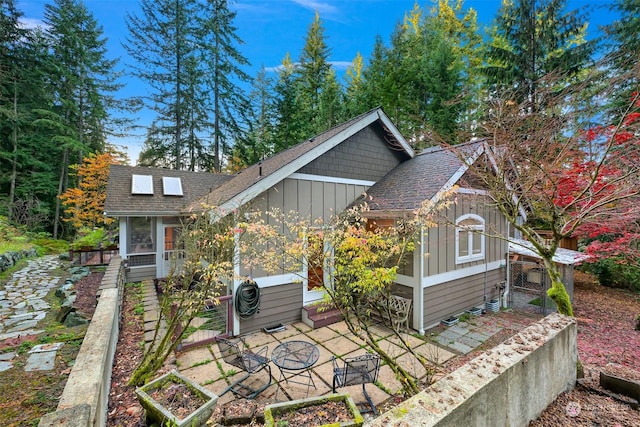 exterior space featuring a sunroom and a patio area