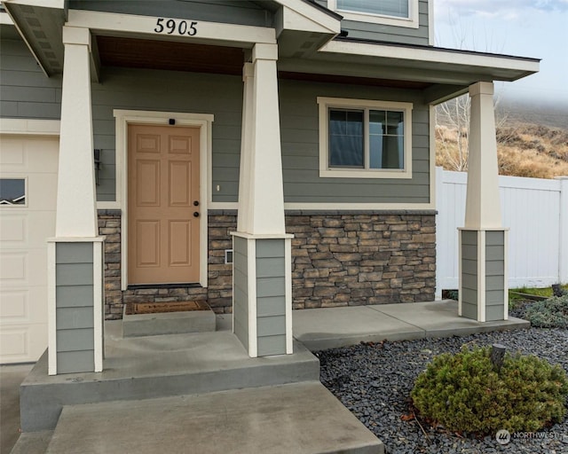 property entrance featuring a porch