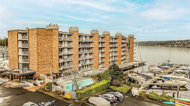 view of building exterior featuring a water view