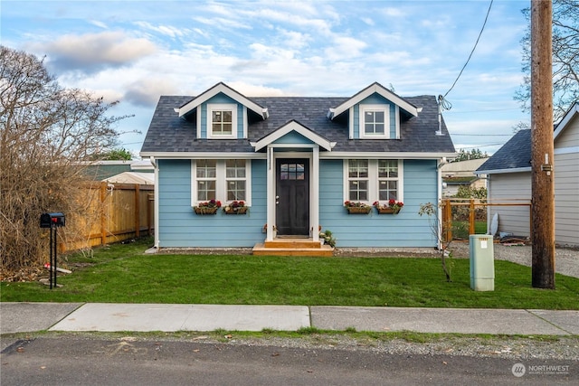 view of front of home featuring a front lawn