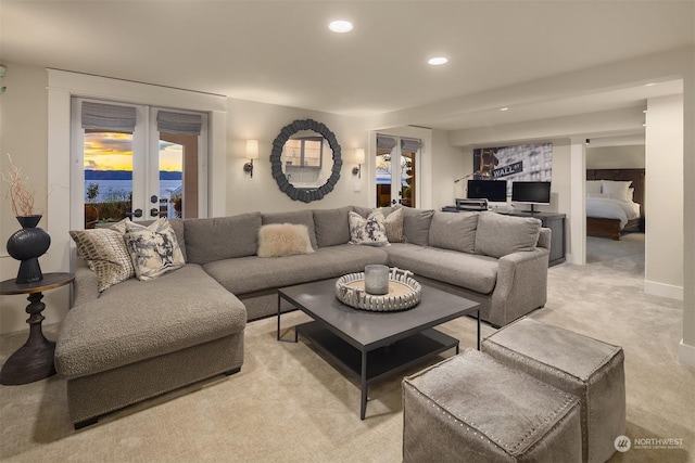 carpeted living room with french doors