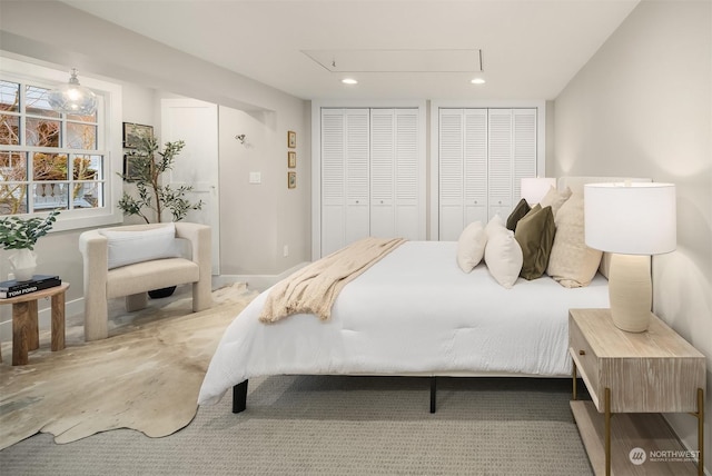 bedroom with two closets