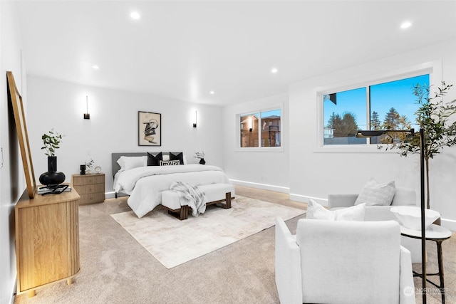 bedroom featuring light colored carpet