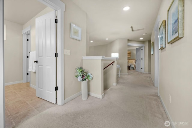 hallway with baseboards, carpet floors, an upstairs landing, and recessed lighting