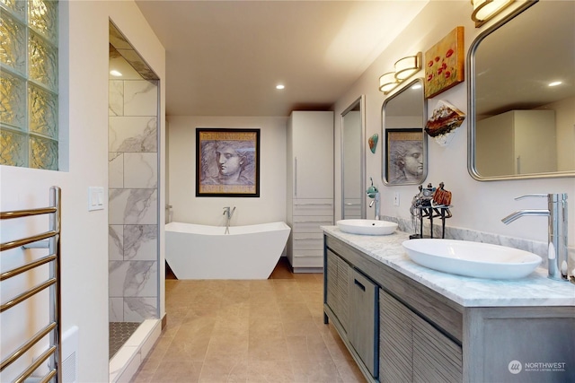 bathroom with vanity, separate shower and tub, and tile patterned floors