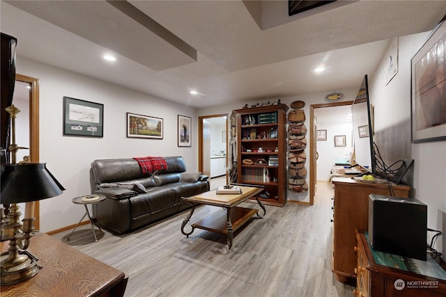 living room with light hardwood / wood-style floors