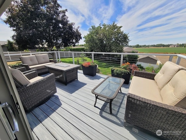 wooden deck featuring an outdoor living space