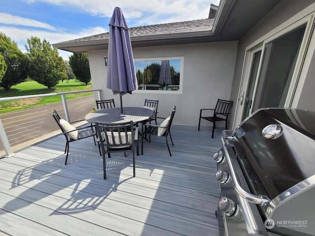 wooden terrace with area for grilling