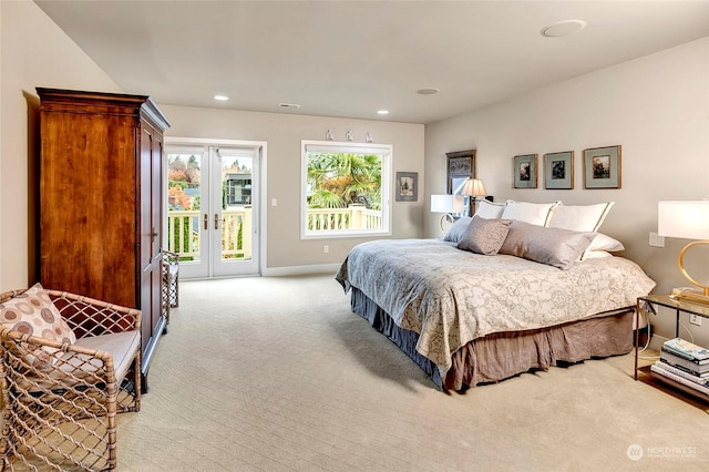 2031 42nd Ave E, Seattle, WA 98112 - bedroom featuring light carpet, access to outside, recessed lighting, and french doors