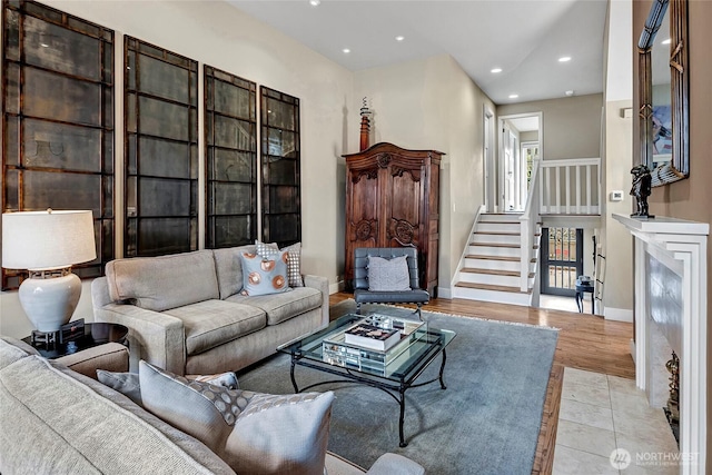 2031 42nd Ave E, Seattle, WA 98112 - living area with recessed lighting, stairway, and light wood finished floors