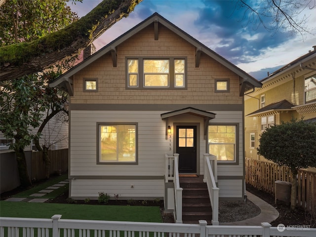 view of front of home with a lawn