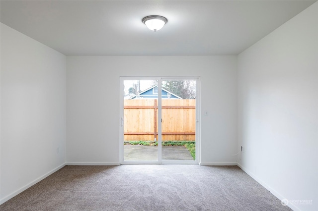 243 23rd Ave Unit 1-9, Longview, WA 98632 - empty room with carpet floors and baseboards