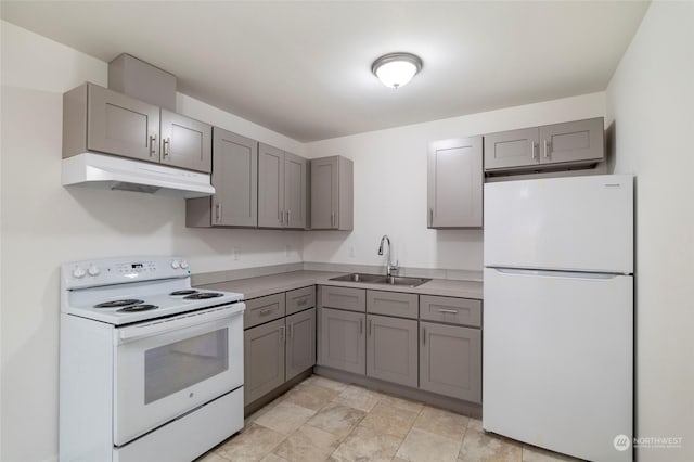 243 23rd Ave Unit 1-9, Longview, WA 98632 - kitchen featuring white appliances, under cabinet range hood, gray cabinets, and light countertops