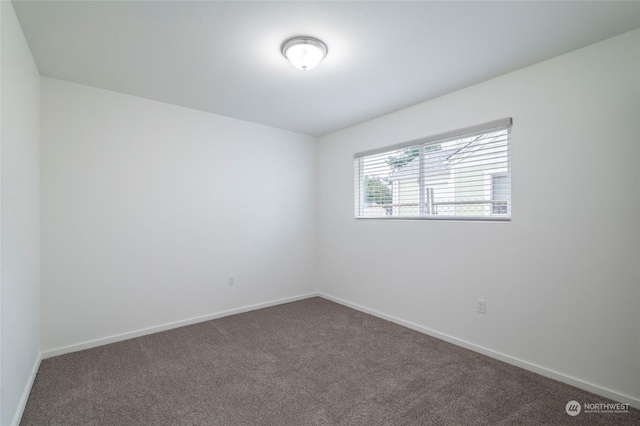 243 23rd Ave Unit 1-9, Longview, WA 98632 - empty room featuring carpet and baseboards