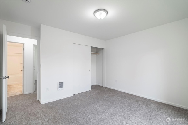 243 23rd Ave Unit 1-9, Longview, WA 98632 - unfurnished bedroom featuring carpet floors and a closet