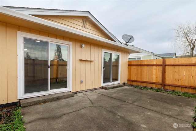 243 23rd Ave Unit 1-9, Longview, WA 98632 - rear view of house featuring a patio