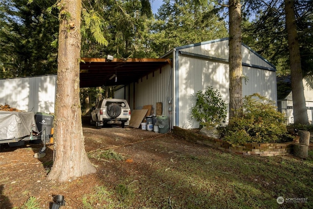 view of outdoor structure with a carport