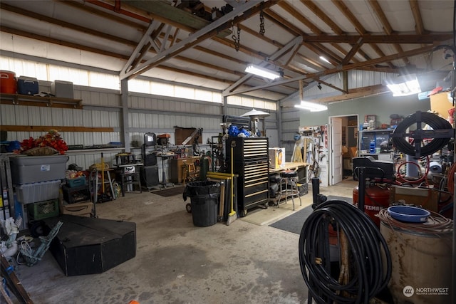 garage with a workshop area