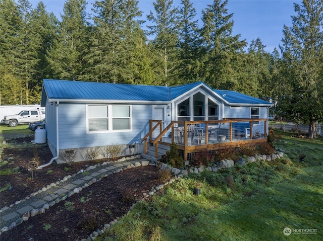 view of front of home with a deck