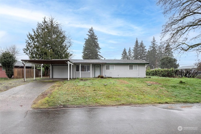 ranch-style home with a front lawn and a carport