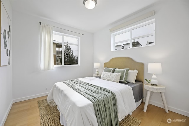 bedroom featuring light hardwood / wood-style floors