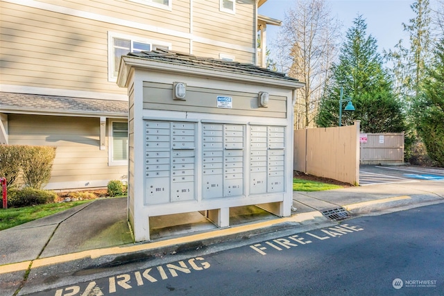 view of home's community featuring a mail area